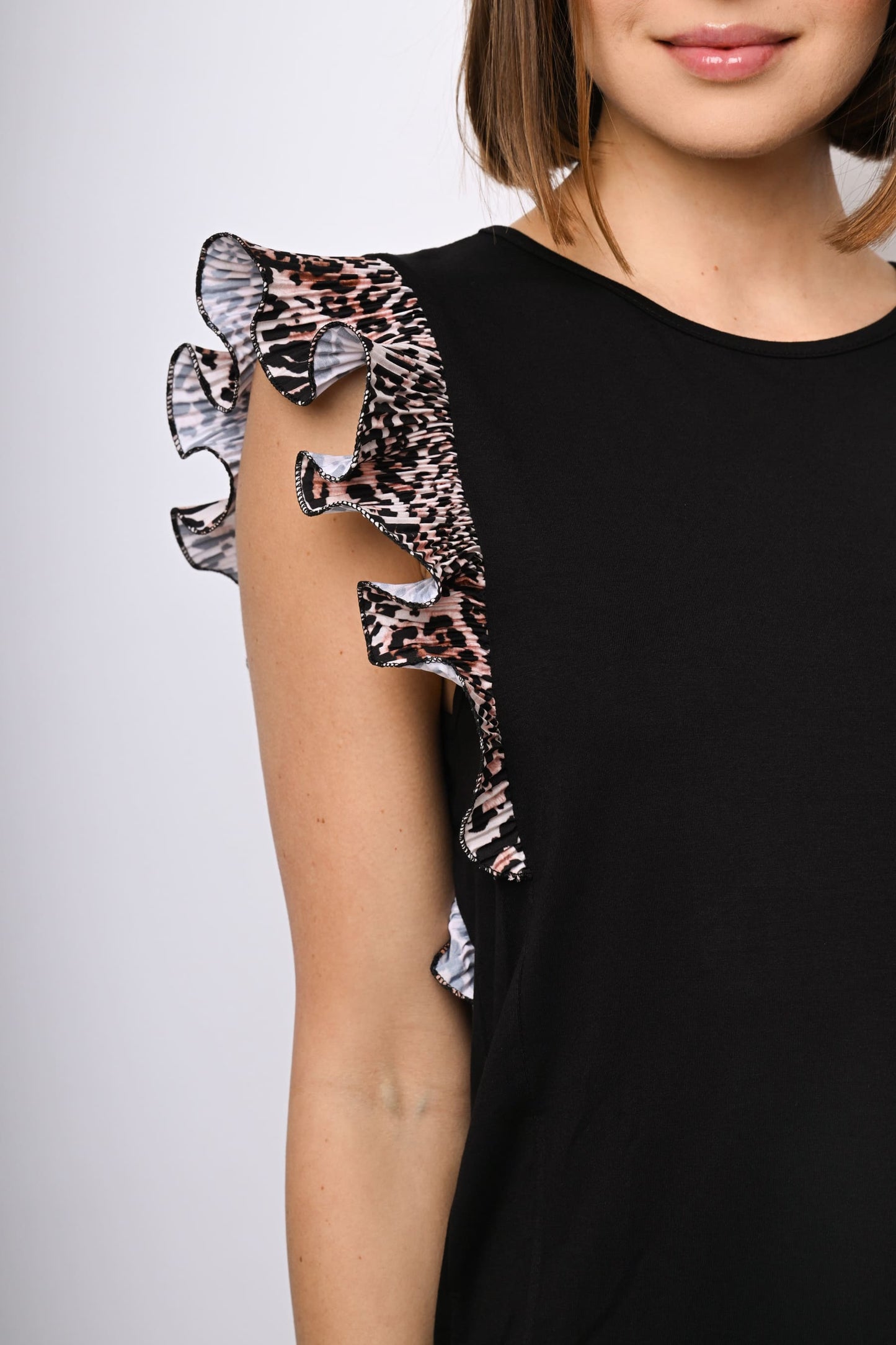 Top con rouches a stampa leopardata